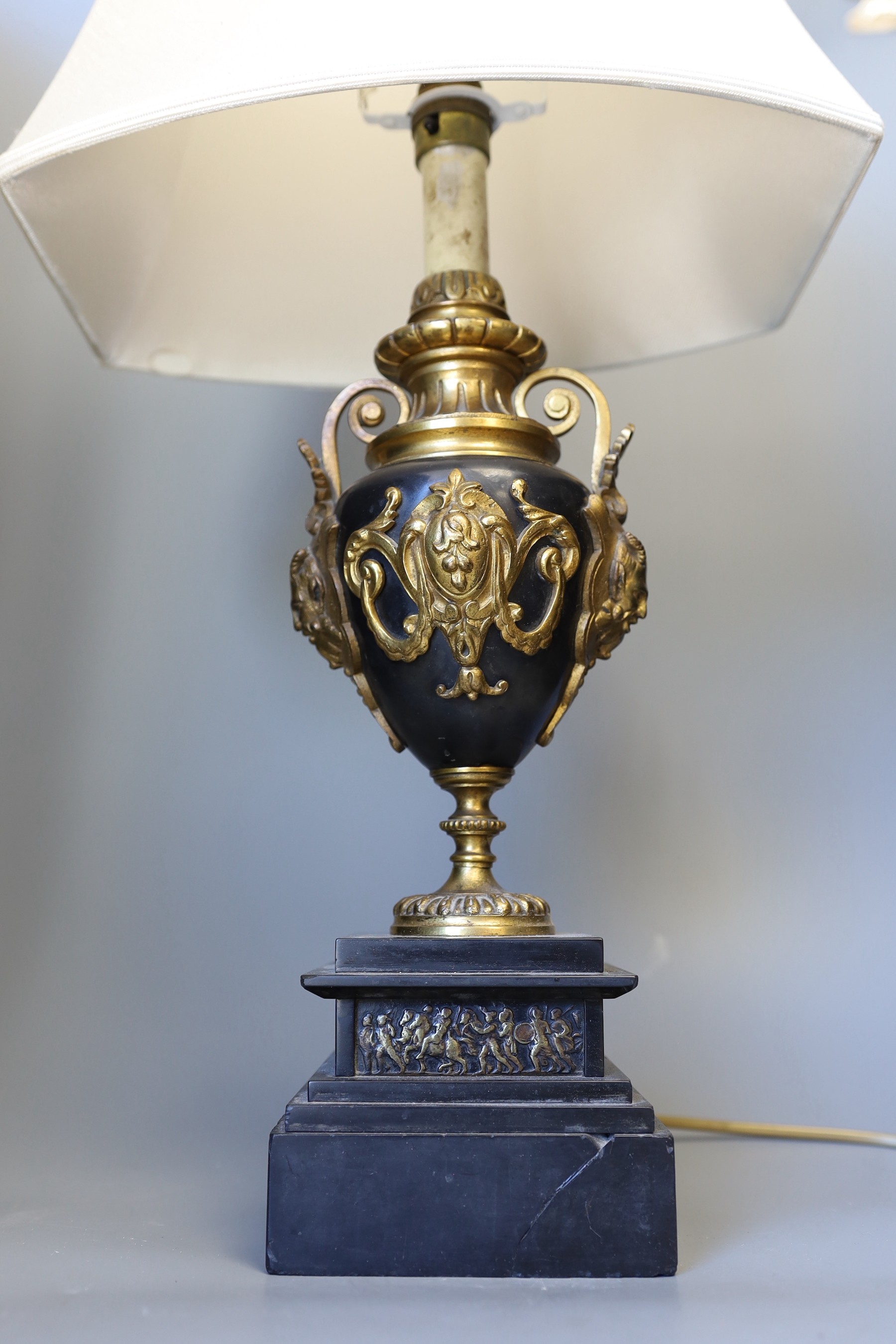 A gilt metal mounted lamp